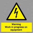 warning-work-in-progress-on-equipmentwith-electrical-hazard-symbol~